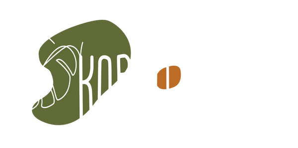 Korra Green logo featuring a stylised leaf and dog silhouette